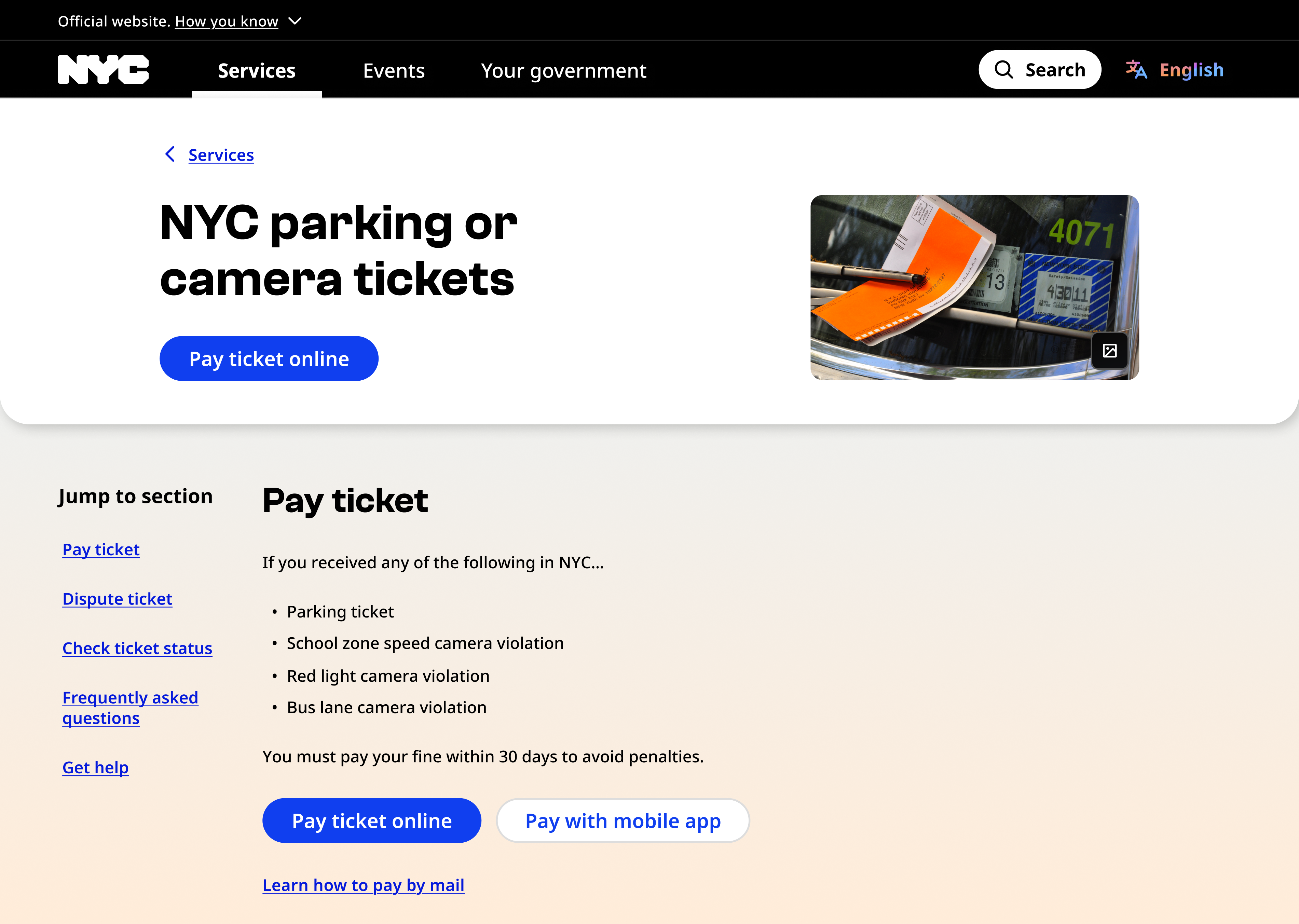 Dekstop nyc.gov screenshot of the "NYC parking or camera tickets" page. An image of a parking ticket is in the page hero. The media credit component is in the bottom right of the parking ticket image.
